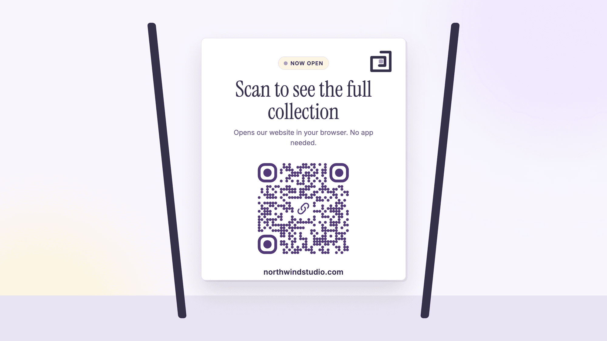An A-frame poster reading scan to see the full collection with a URL QR code and the address northwindstudio.com